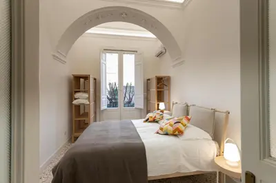 Letto o letti in una camera di VITTORIO EMANUELE HOUSE