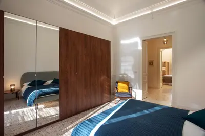 Letto o letti in una camera di VITTORIO EMANUELE HOUSE