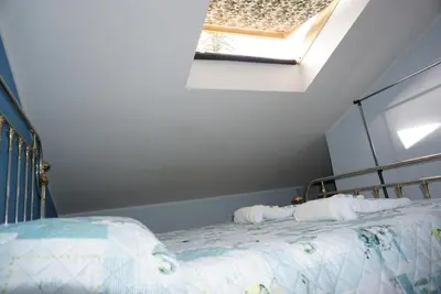 Letto o letti in una camera di Villetta Artale Marina