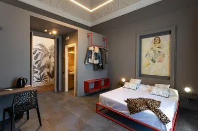 Letto o letti in una camera di 81 Suite and Breakfast