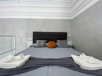 Letto o letti in una camera di Superior Apartment Catania