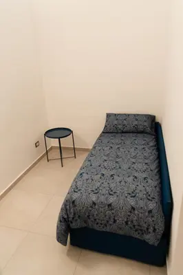 Letto o letti in una camera di Arté