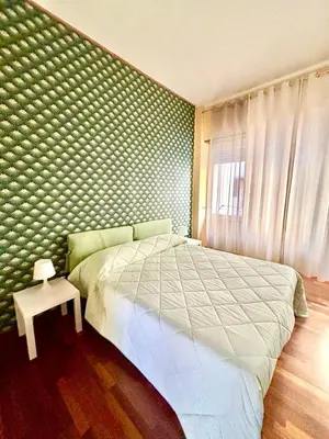 Letto o letti in una camera di A due passi dalla metro