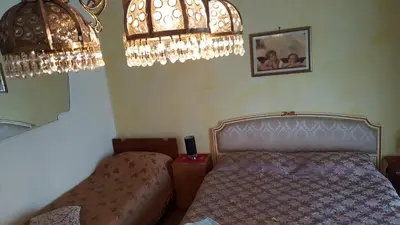 Letto o letti in una camera di B&B United States of Europe