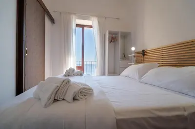 Letto o letti in una camera di Casa Scala