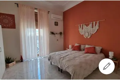 Letto o letti in una camera di Etna Ocean Rooms