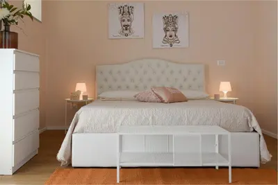 Letto o letti in una camera di Filomena Graceful