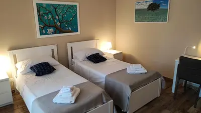 Letto o letti in una camera di VIOLET HOUSE.