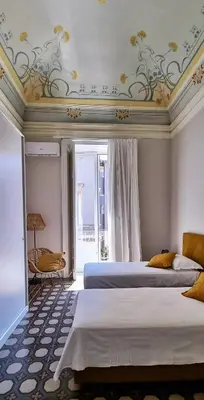 Letto o letti in una camera di La Renaissance