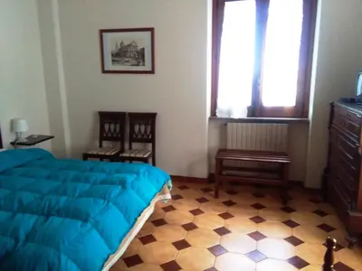 Letto o letti in una camera di Il Vigneto