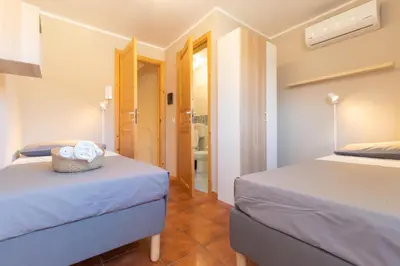 Letto o letti in una camera di L'angoletto del viaggiatore