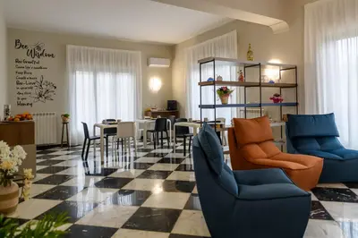 Area soggiorno di Bee Happy - Bed and Breakfast