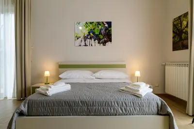 Letto o letti in una camera di Bee Happy - Bed and Breakfast