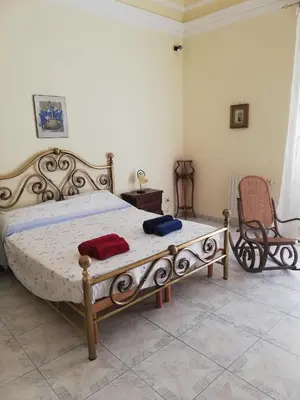 Letto o letti in una camera di Inna's rooms in the History center