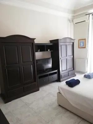 Letto o letti in una camera di Inna's rooms in the History center