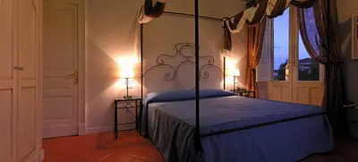 Letto o letti in una camera di Etna Hotel