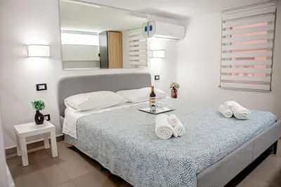 Letto o letti in una camera di Ruggero Settimo - Holiday Houses