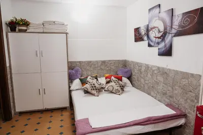 Letto o letti in una camera di Perla Azzurra