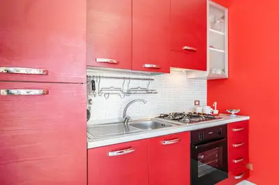 Cucina o angolo cottura di GuestHost - Castello Normanno Modern Sea View Apartment