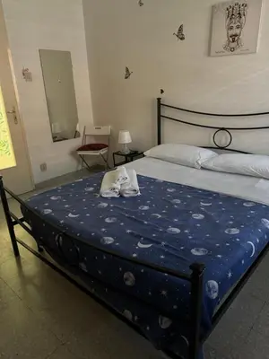 Letto o letti in una camera di ORCHIDEA HOUSE
