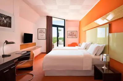 Letto o letti in una camera di Four Points by Sheraton Catania Hotel
