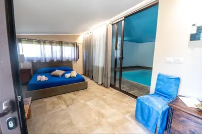 Letto o letti in una camera di Villa Giustega