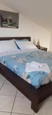 Letto o letti in una camera di Etna mare