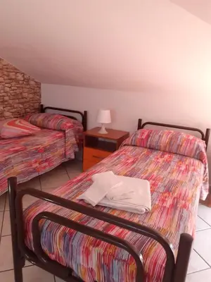 Letto o letti in una camera di Etna mare