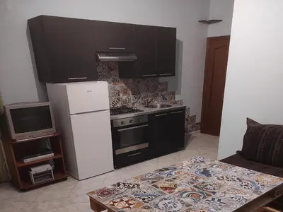 Cucina o angolo cottura di Apartment with air conditioning and salt pool