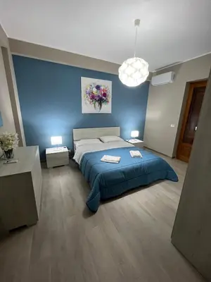 Letto o letti in una camera di Casa vacanza Tropicana Home