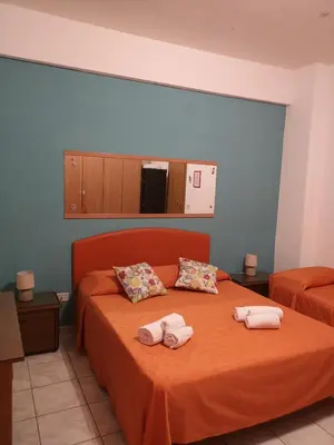 Letto o letti in una camera di B&B Casa Valeria