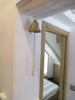 Letto o letti in una camera di Alba Chiara