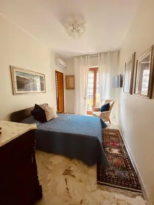 Letto o letti in una camera di Ammari Home
