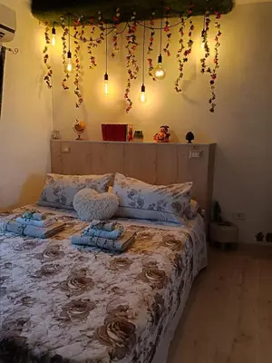 Letto o letti in una camera di ENCANTO APARTMENT