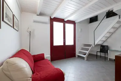 Area soggiorno di Woodenloft14