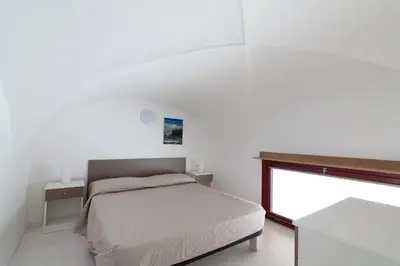 Letto o letti in una camera di Woodenloft14