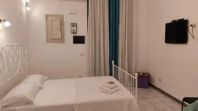 Letto o letti in una camera di Vicolo Stretto