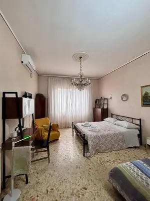 Letto o letti in una camera di Appartamento turistico Giarre