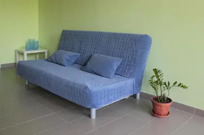 Area soggiorno di Etna Holiday Home