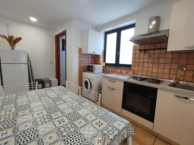 Cucina o angolo cottura di Appartamento Aci Sant'Antonio