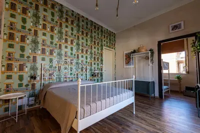 Letto o letti in una camera di Locanda Popolare