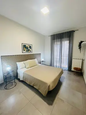 Letto o letti in una camera di Casa Lulu