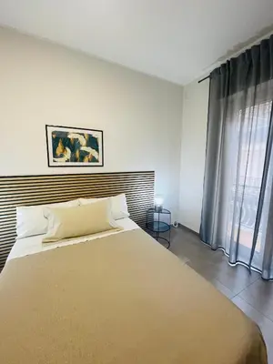 Letto o letti in una camera di Casa Lulu