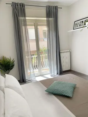 Letto o letti in una camera di Casa Lulu