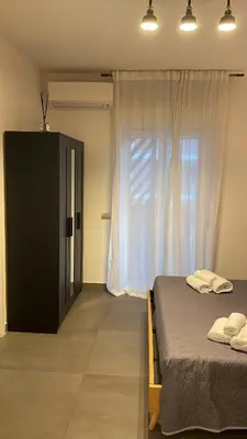 Letto o letti in una camera di Stella Rooms
