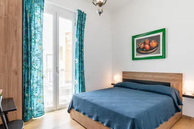 Letto o letti in una camera di Aurora Rooms