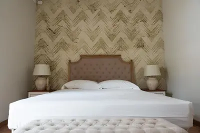 Letto o letti in una camera di B&B Donna Cinzia