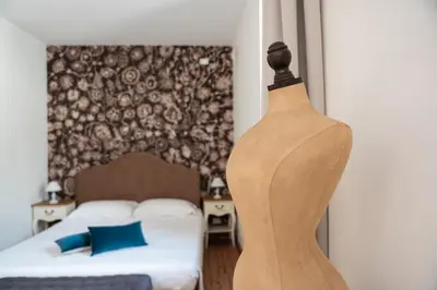 Letto o letti in una camera di B&B Donna Cinzia