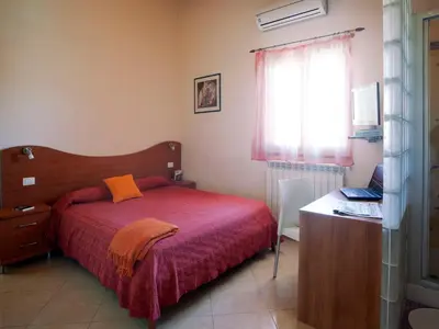 Letto o letti in una camera di Motta Residence Hotel