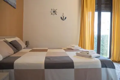 Letto o letti in una camera di L'angolo di Acitrezza